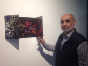 PHOTO 2 : L'artiste peintre David Farsi et la maquette d'un tryptique de très grand format, qui était exposé jusqu'à récemment à la Tohu;